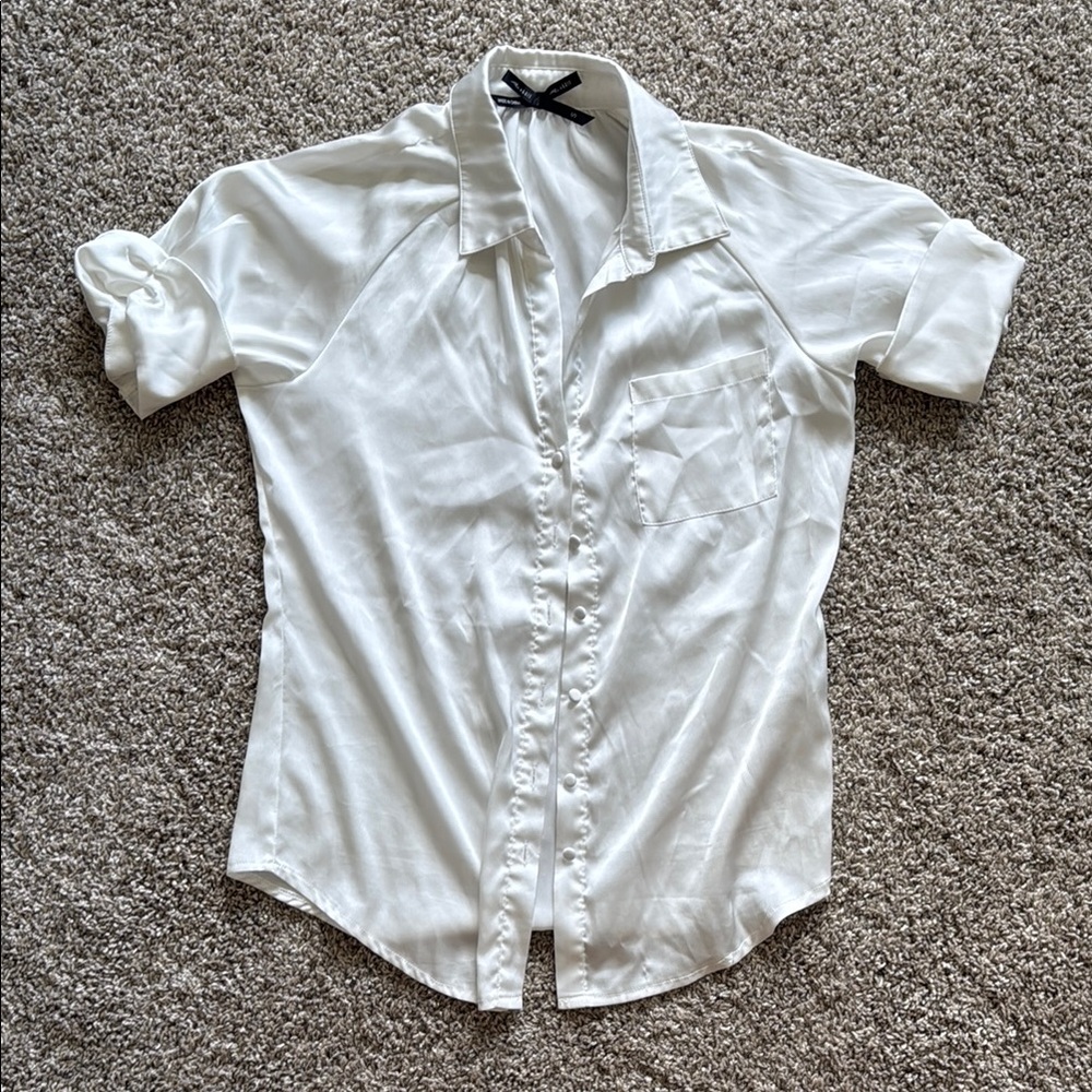 Akris Elegant Cream Blouse with Black Accents
